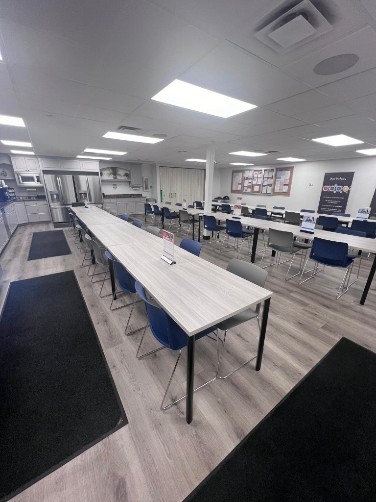 Commercial breakroom and common area after service — no people. Photo 1 of 4.