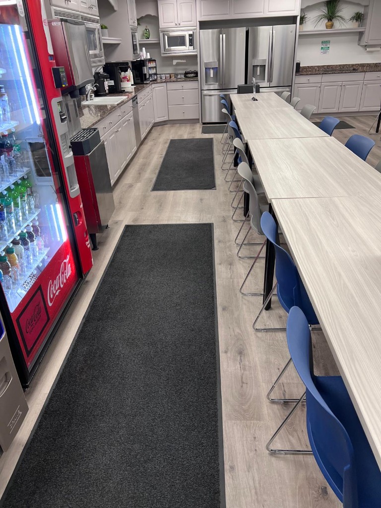 Commercial breakroom and common area after service — no people. Photo 2 of 4.