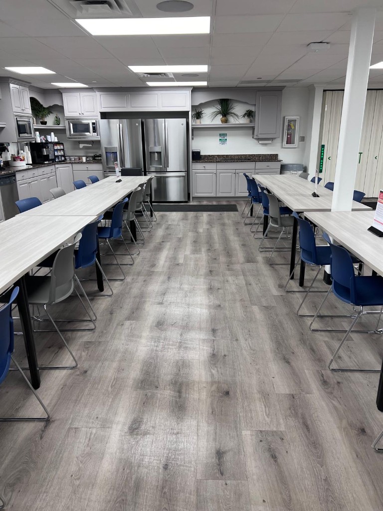 Commercial breakroom and common area after service — no people. Photo 4 of 4.