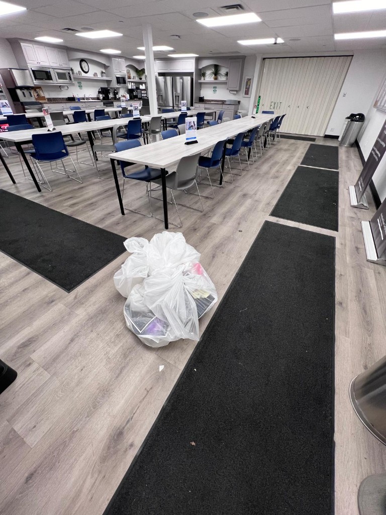Commercial breakroom and common area before service — no people. Photo 1 of 12.