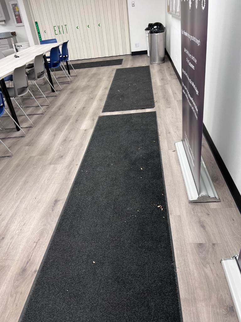 Commercial breakroom and common area before service — no people. Photo 4 of 12.