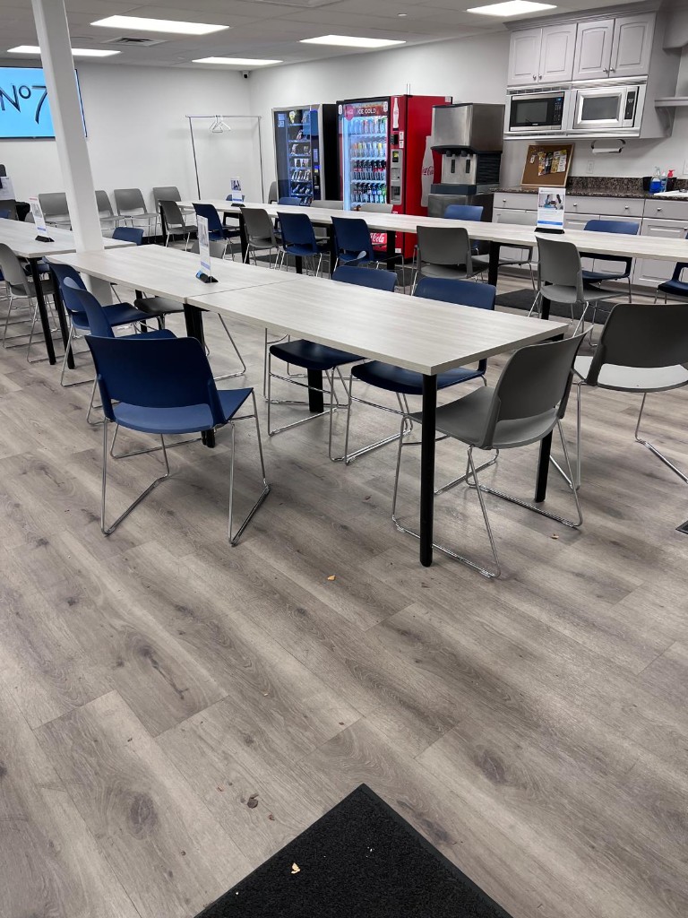 Commercial breakroom and common area before service — no people. Photo 7 of 12.