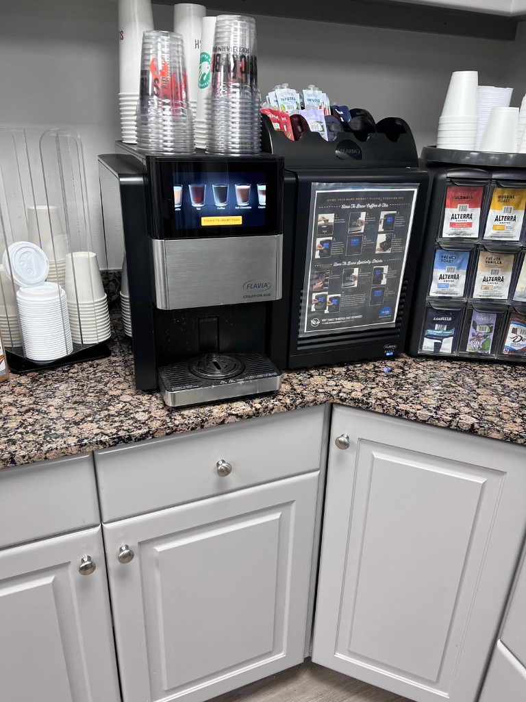 Commercial breakroom and common area before service — no people. Photo 9 of 12.
