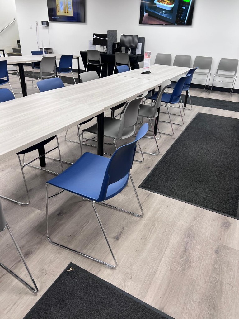 Commercial breakroom and common area before service — no people. Photo 10 of 12.