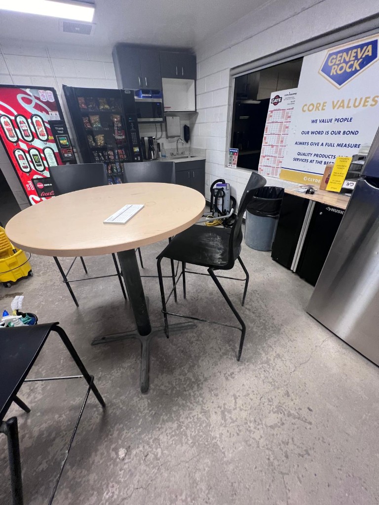 Industrial breakroom and common area before service — no people. Photo 3 of 4.