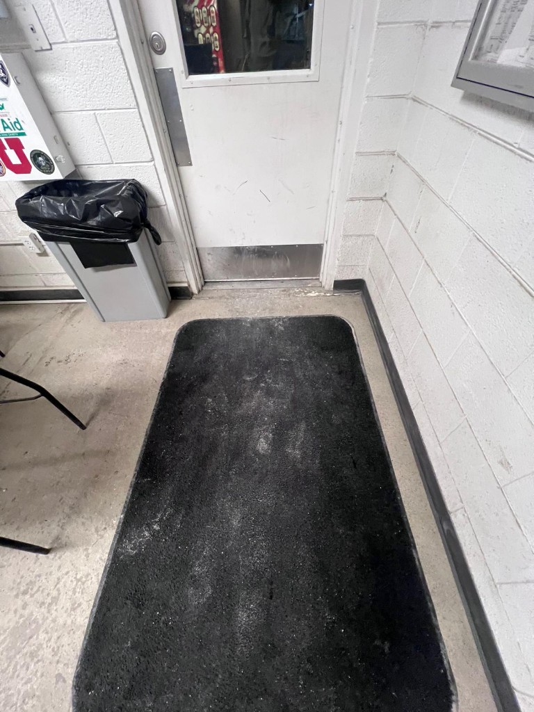 Industrial breakroom and common area before service — no people. Photo 4 of 4.
