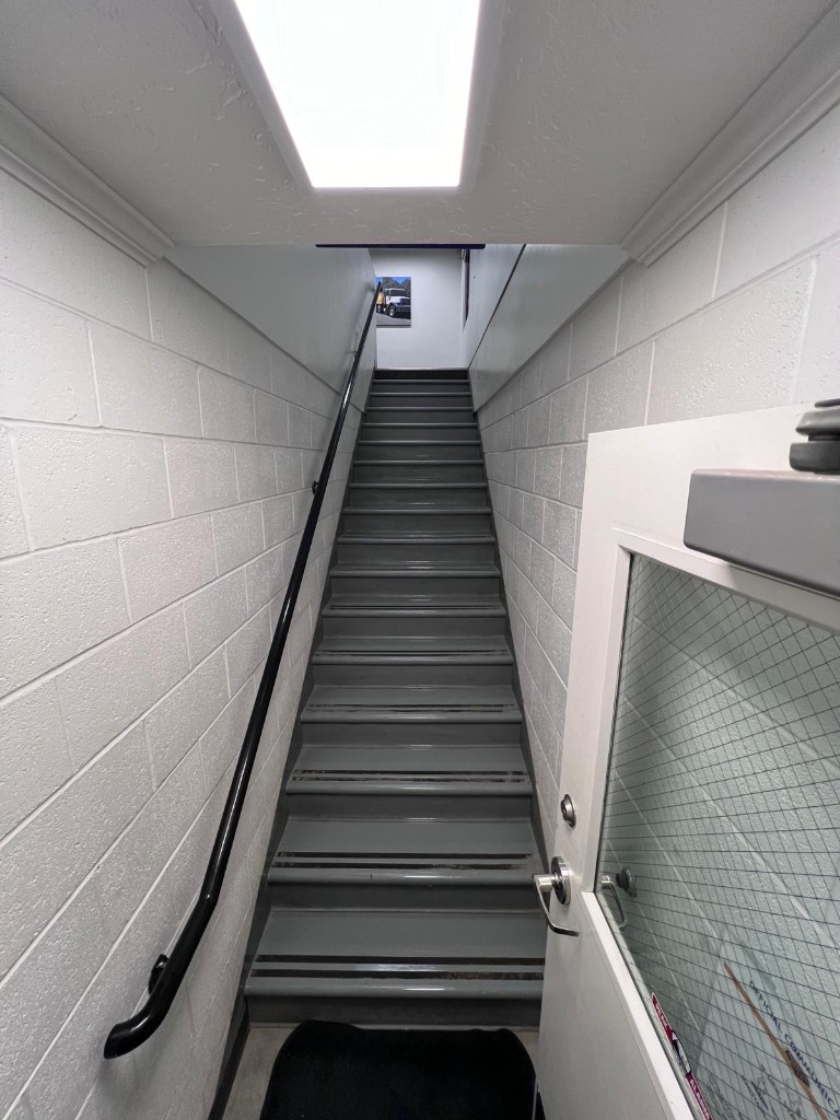 Commercial interior stair after service — no people. Reference photo 1 of 1.
